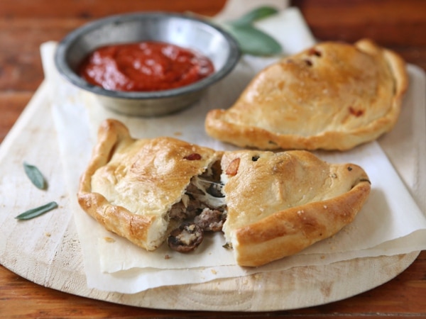 Calzones with Sausage, Mushrooms and Olives from completelydelicious.com