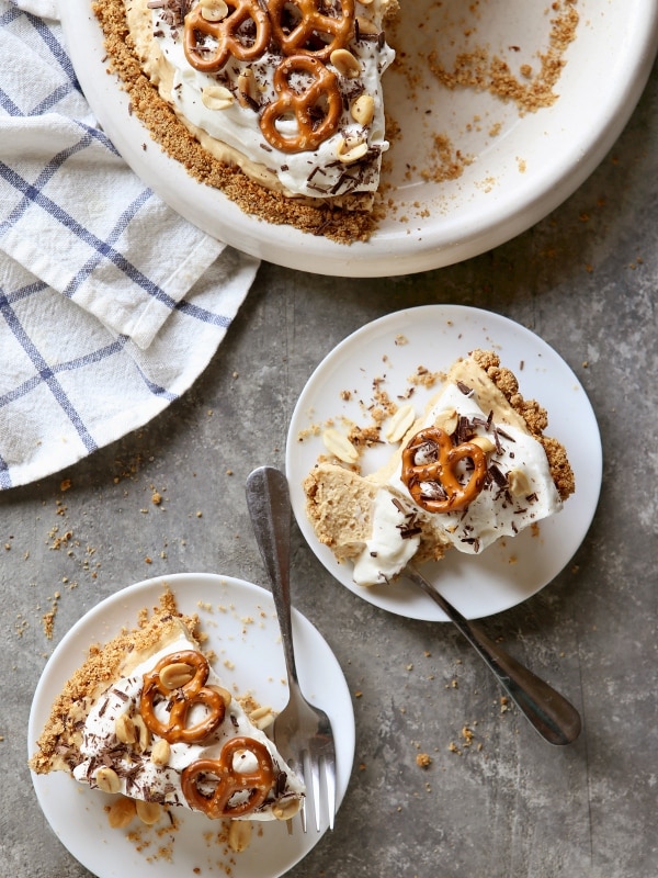 Peanut Butter Mousse Pie with Marshmallow Whipped Cream and Pretzel Crust | completelydelicious.com