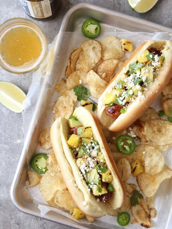 Hot Dogs with Pineapple Avocado Salsa | completelydelicious.com