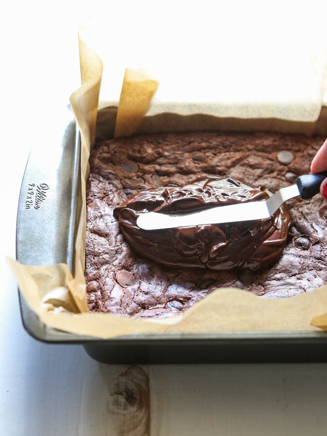 These fudge brownies are topped with chocolate ganache icing