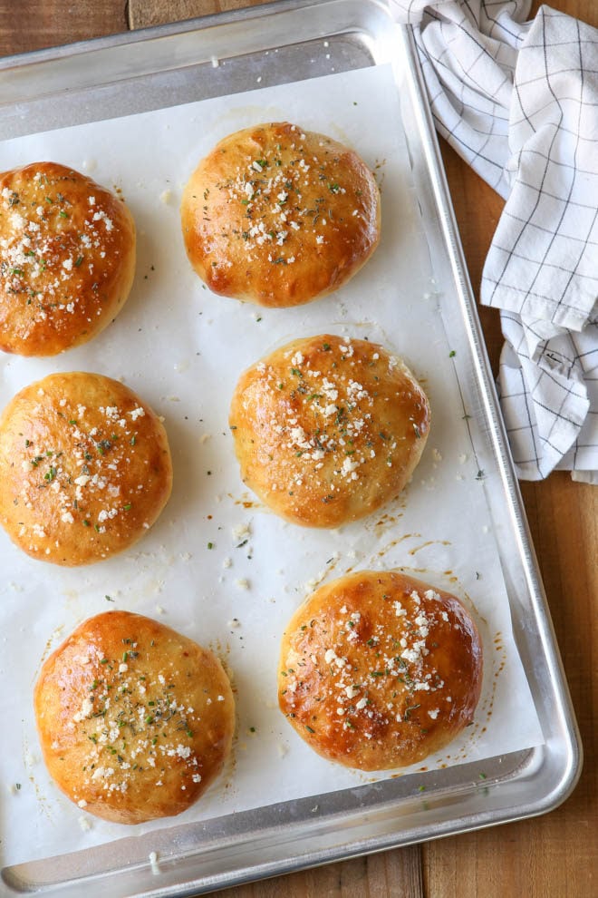 Homemade cheesy herb burger buns elevate any cookout!