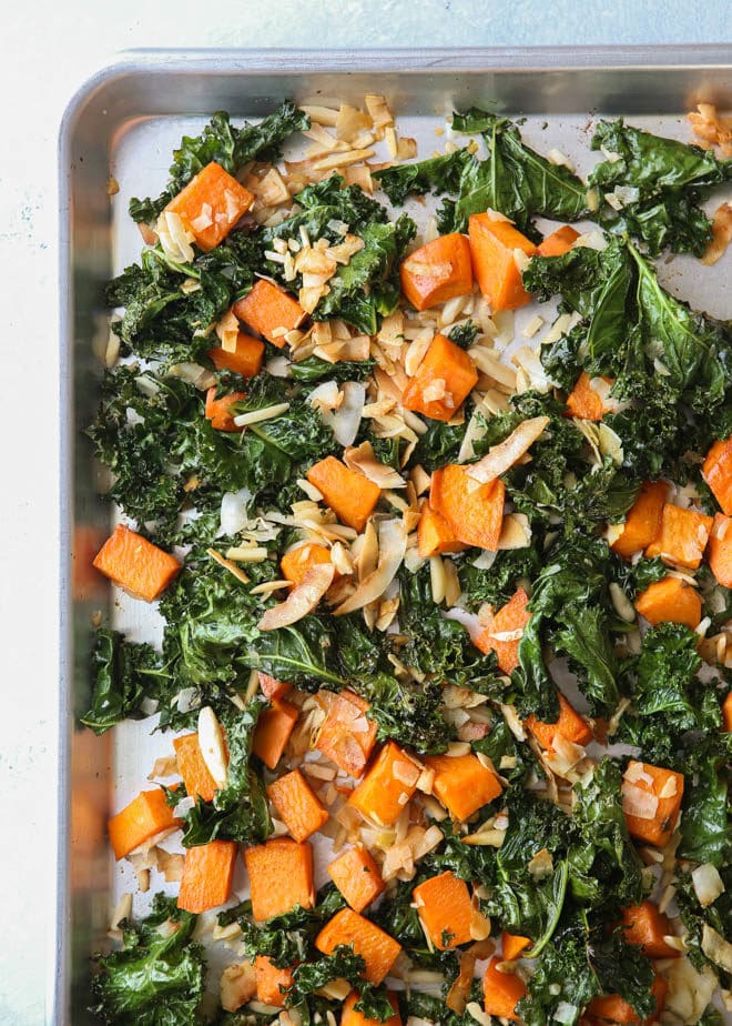Roasted sweet potatoes and kale with shredded coconut and almonds