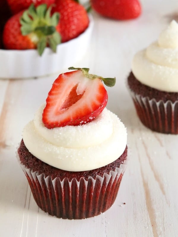 Classic red velvet cupcakes with cream cheese frosting from completeldelicious.com