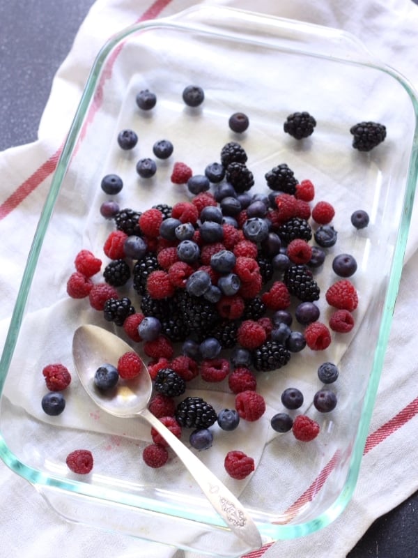 Vanilla Bean Panna Cotta with Roasted Berries | completelydelicious.com