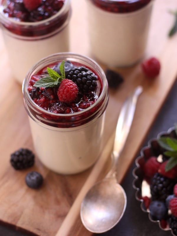 Vanilla Bean Panna Cotta with Roasted Berries | completelydelicious.com