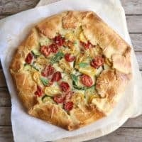 Rustic Tomato Zucchini Pie with Cornmeal Crust from completelydelicious.com