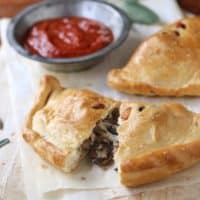Calzones with Sausage, Mushrooms and Olives from completelydelicious.com