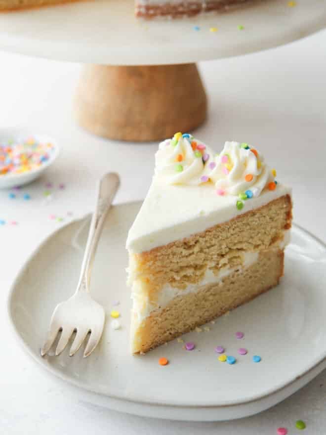 a slice of sugar cookie layer cake