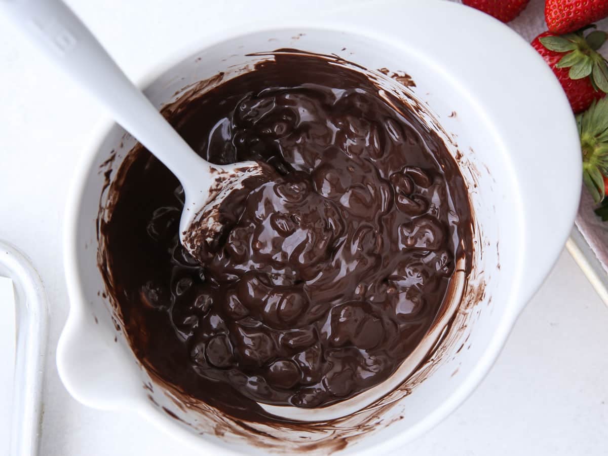 melting chocolate in a white bowl
