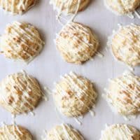 White Chocolate-Dipped Tropical Macaroons with Pineapple, Macadamia Nuts and Coconut | completelydelicious.com