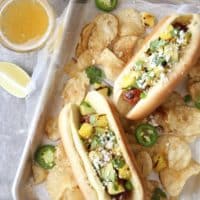 Hot Dogs with Pineapple Avocado Salsa | completelydelicious.com