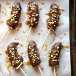 Chocolate Covered Frozen Bananas with Salted Caramel and Walnuts | completelydelicious.com