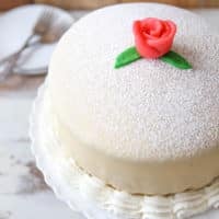 Princess Cake - sponge cake with vanilla and raspberry filling covered with marzipan | completelydelicious.com