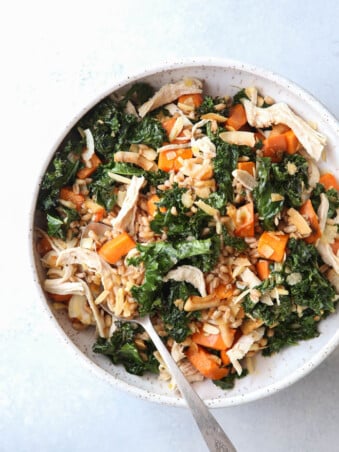 This farro bowl with chicken, kale and sweet potatoes is one of my favorite healthy meals!