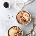 These apple cinnamon oatmeal bowls made in the pressure cooker and topped with pecans and maple syrup are perfect for fall!