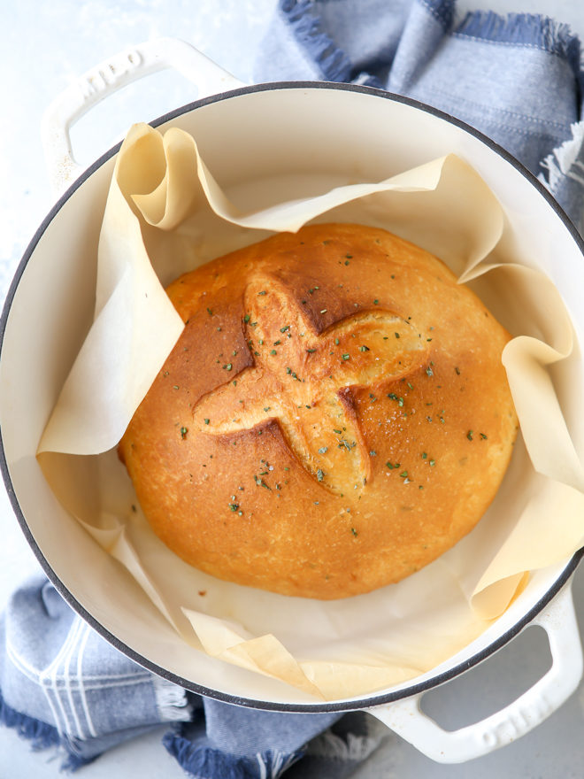Bake this easy herb bread loaf in your dutch oven for a crispy crust!