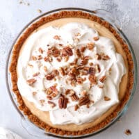 Creamy caramel pudding pie with gingersnap and pecan crust - so decadent and stunning!