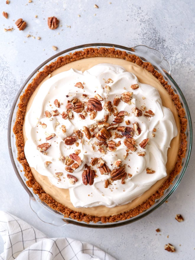 Creamy caramel pudding pie with gingersnap and pecan crust - so decadent and stunning!