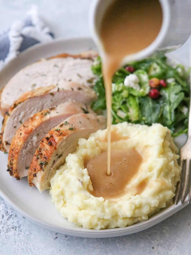 Homemade turkey gravy made from pan drippings is a must for Thanksgiving!