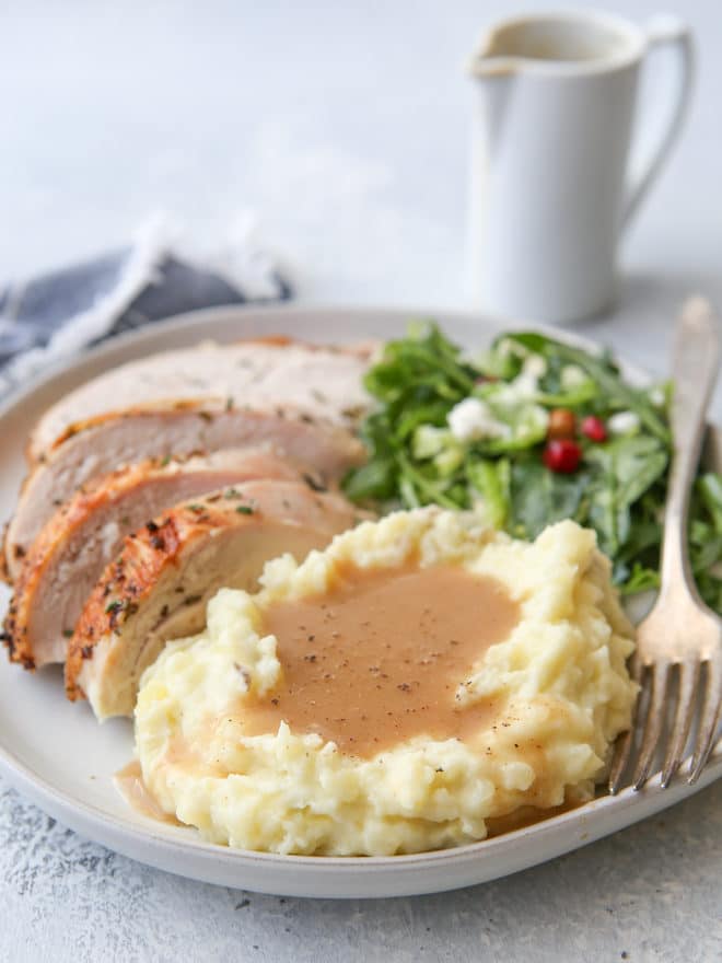 Homemade turkey gravy made from pan drippings is a must for Thanksgiving!