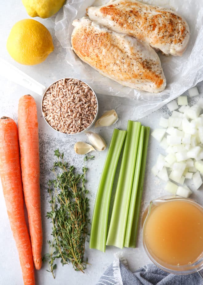 Hearty ingredients needed for lemon, chicken, and farro soup