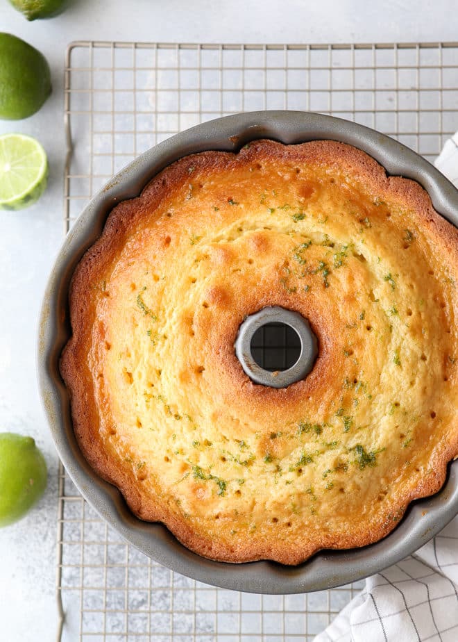A lime simple syrup drizzled over the cake after baking keeps the cake super moist and gives it an intense lime flavor.
