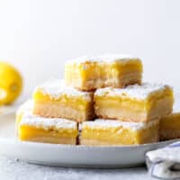 Classic lemon bars with a buttery shortbread crust, tart lemon filling, and powdered sugar topping is always a crowd favorite!
