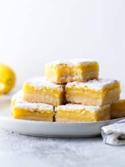 Classic lemon bars with a buttery shortbread crust, tart lemon filling, and powdered sugar topping is always a crowd favorite!