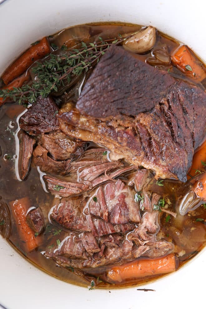 Pot roast cooked in the slow cooker is so tender and full of flavor