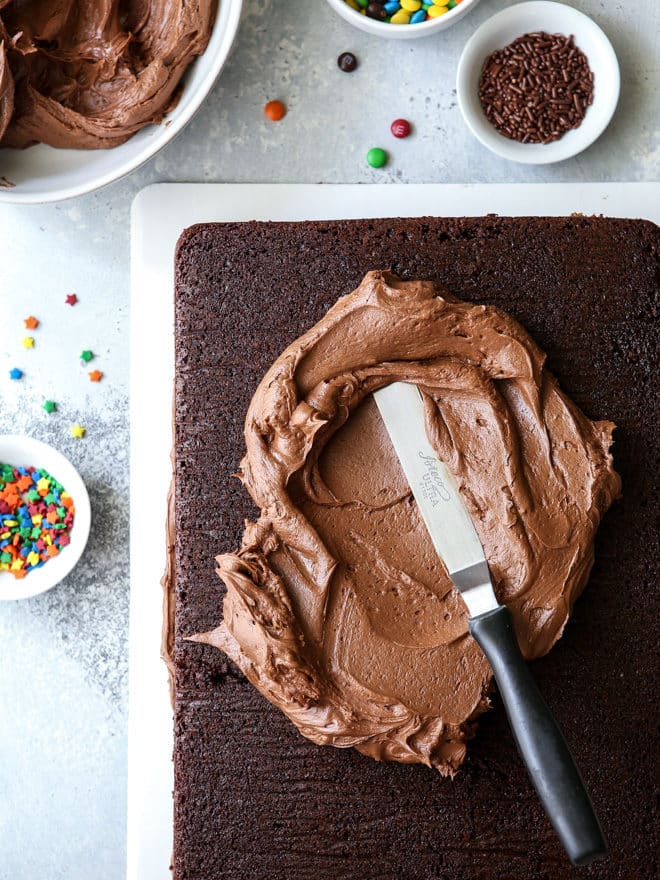 Easy fudge buttercream frosting takes this chocolate sheet cake up a notch!