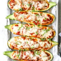 These sausage stuffed zucchini boats are cheesy and delicious, and have my whole family's stamp of approval.