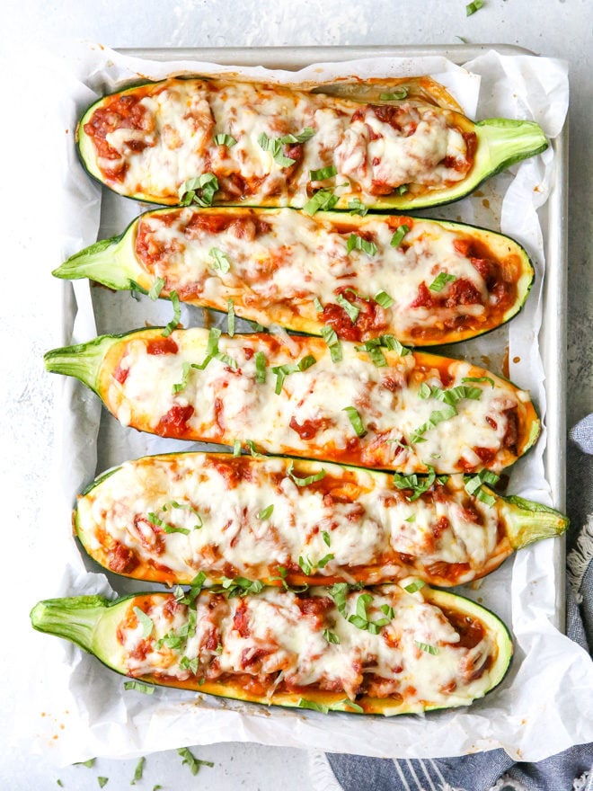 These sausage stuffed zucchini boats are cheesy and delicious, and have my whole family's stamp of approval. 