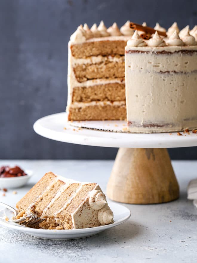 This brown sugar cinnamon layer cake is full of autumn flavor and spice, with moist cake layers and the fluffiest buttercream frosting!