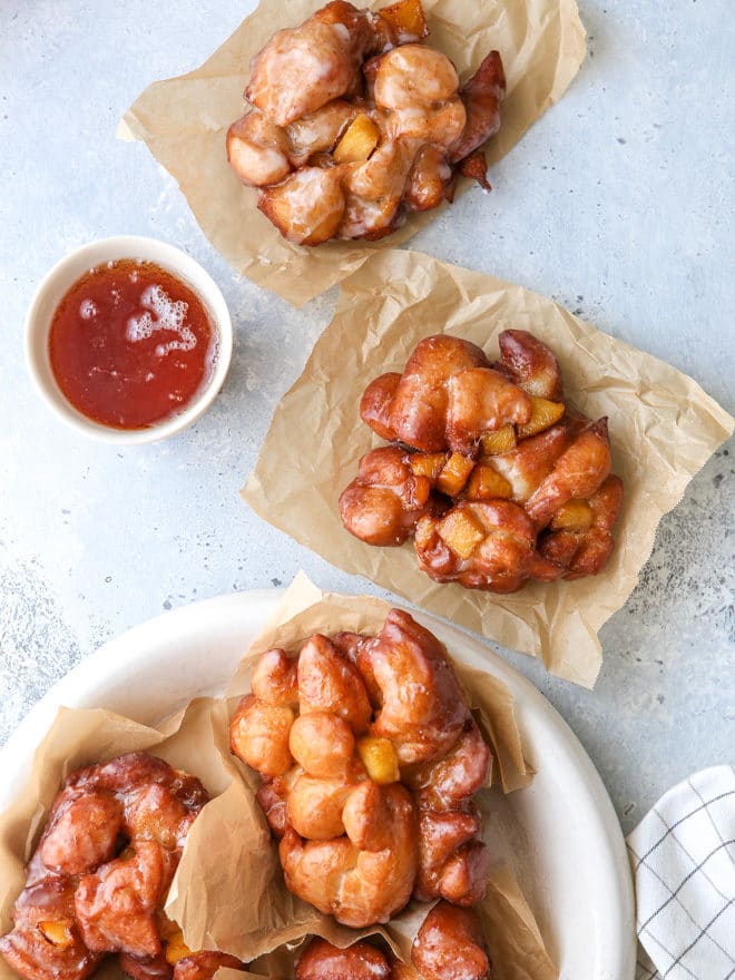 Homemade sourdough apple fritters made with yeast-risen dough folded together with juicy cinnamon apples are the ultimate fall treat!
