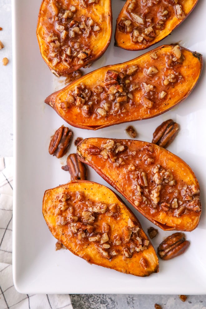 These roasted sweet potatoes with maple pecan sauce are the ultimate sweet and savory side dish!