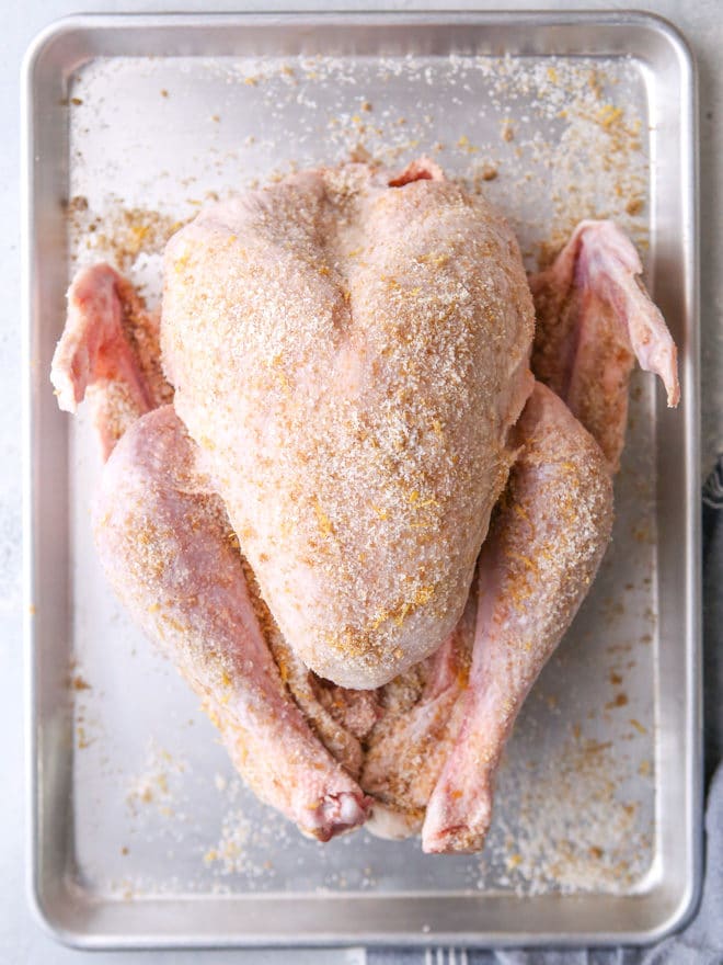 A dry brine and uncovered overnight rest in the fridge are key to this roasted turkey