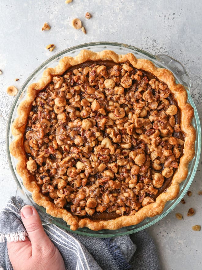 Pumpkin pie with nut praline is a delicious twist on the classic that's perfect for your holiday table!