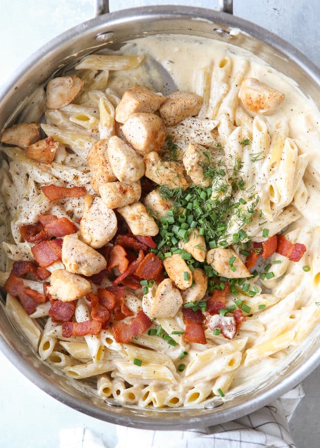 This chicken bacon ranch pasta is an easy meal the whole family will love. It's filled with chicken breast, crispy bacon, fresh herbs, and smothered with a rich sour cream sauce.