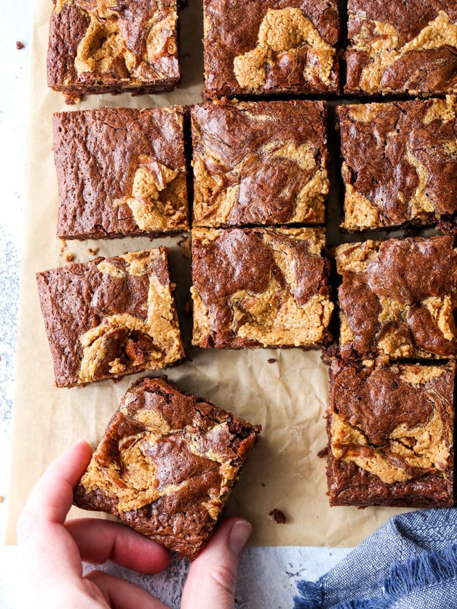 These peanut butter swirl brownies are just as amazing as they sound. Rich chocolate brownies with a swirl of peanut butter filling— irresistible!