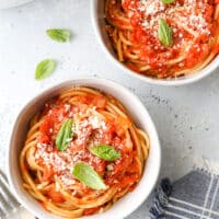 This easy homemade marinara sauce is made with simple staple ingredients like canned tomatoes, onion, garlic, and herbs. Use it with pasta, casseroles and more!