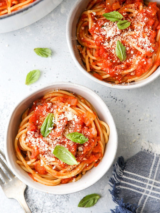 This easy homemade marinara sauce is made with simple staple ingredients like canned tomatoes, onion, garlic, and herbs. Use it with pasta, casseroles and more!