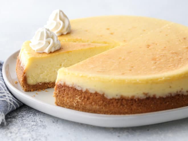 Classic cheesecake with graham cracker crust is silky smooth, ultra rich, and very creamy.