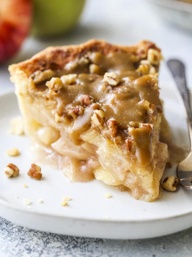 closeup of apple pear praline pie slice on plate