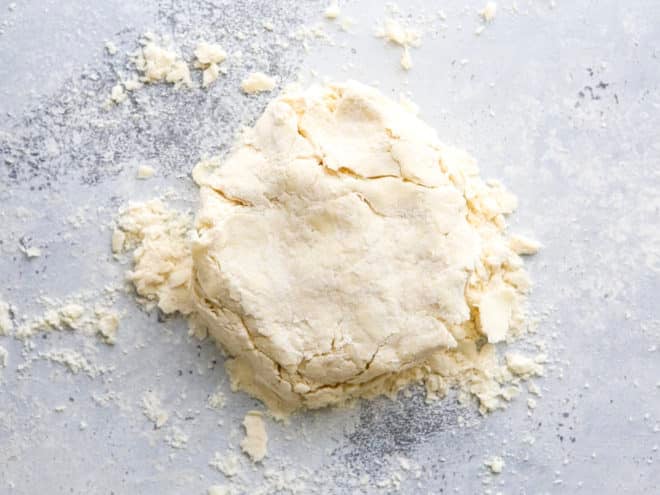 shaping pie crust into disk