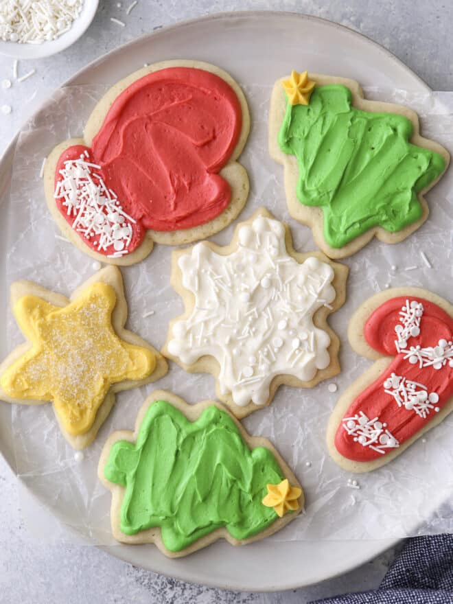 closeup of frosted sugar cookie cut outs on a plate