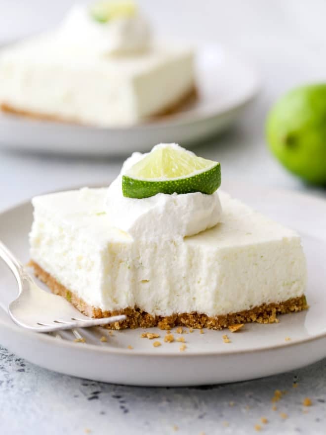 lime cheesecake bar with a bite taken out of it