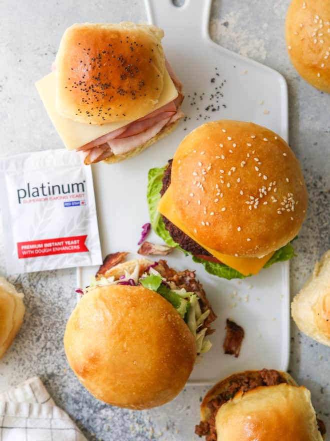 sandwiches, sliders and burgers on different buns with Red Star Yeast envelope