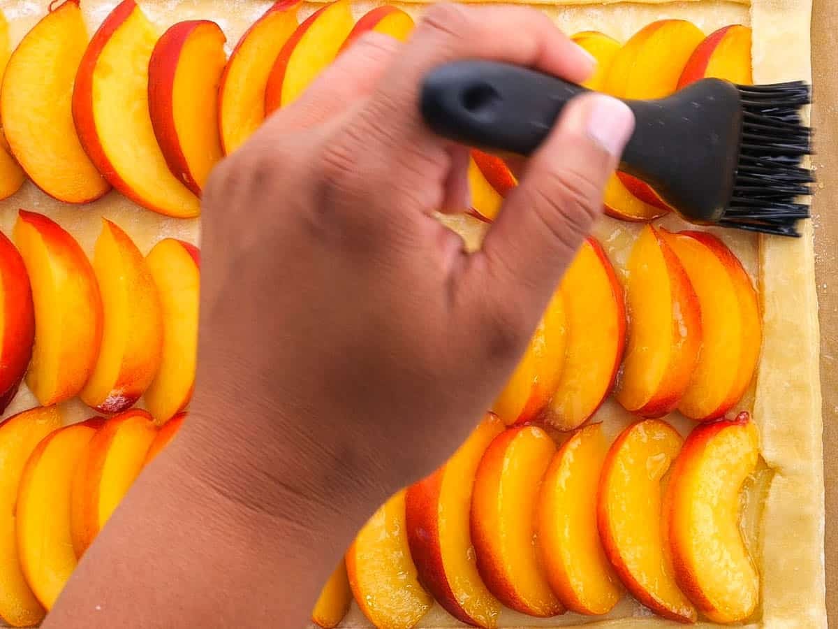 brushing fruit with melted butter