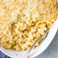 baked macaroni and cheese in baking dish with spoon