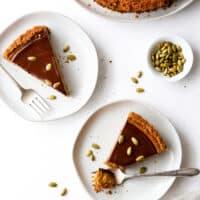 taking a forkful of chocolate pumpkin tart slices